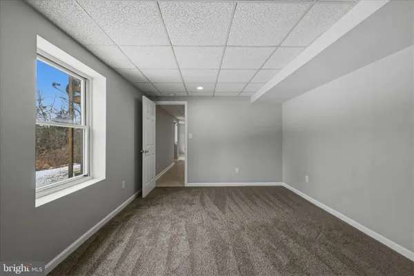 a view of a balcony with trees