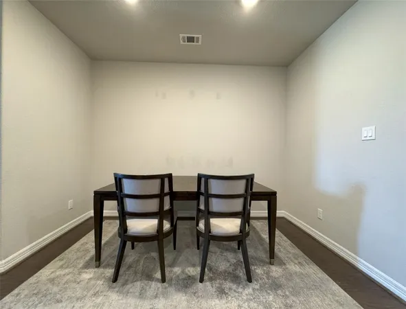 a view of a room with furniture