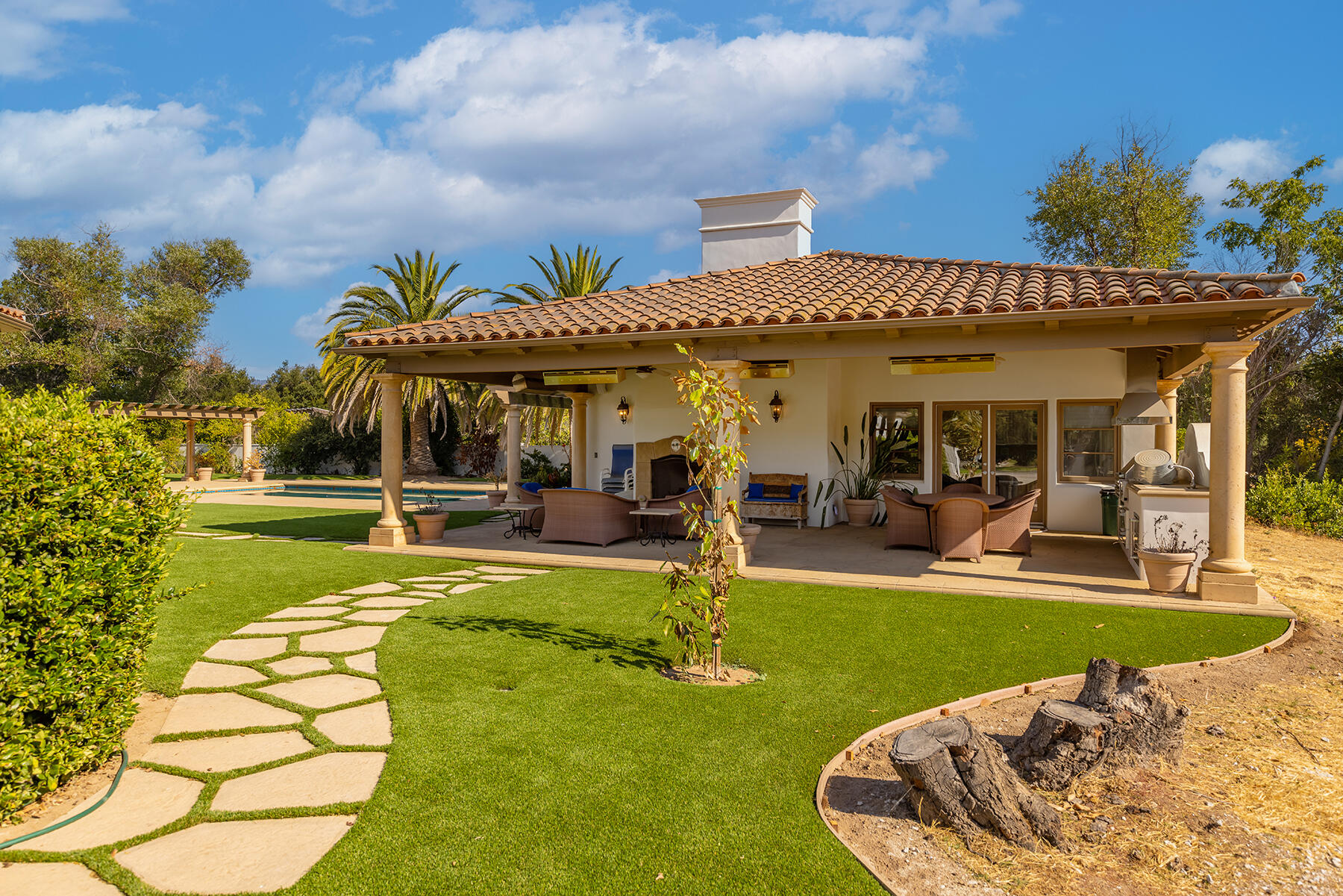 1000 Shokat Drive Ojai, CA 93023 - Photo 19 of 55 a view of a house with swimming pool and sitting area