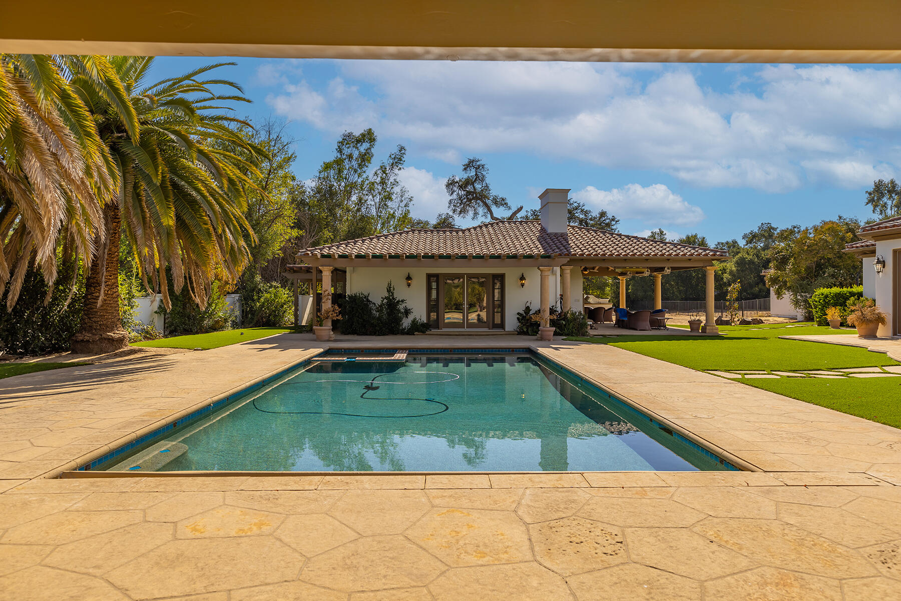 1000 Shokat Drive Ojai, CA 93023 - Photo 25 of 55 a view of swimming pool with lawn chairs and plants