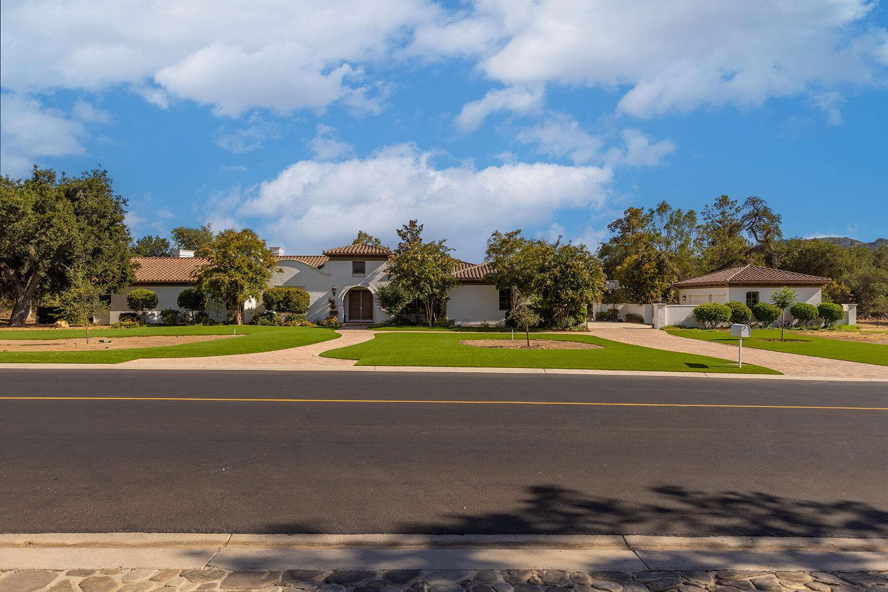 1000 Shokat Drive Ojai, CA 93023 - Photo 30 of 55 a view of a house with a big yard and a large trees