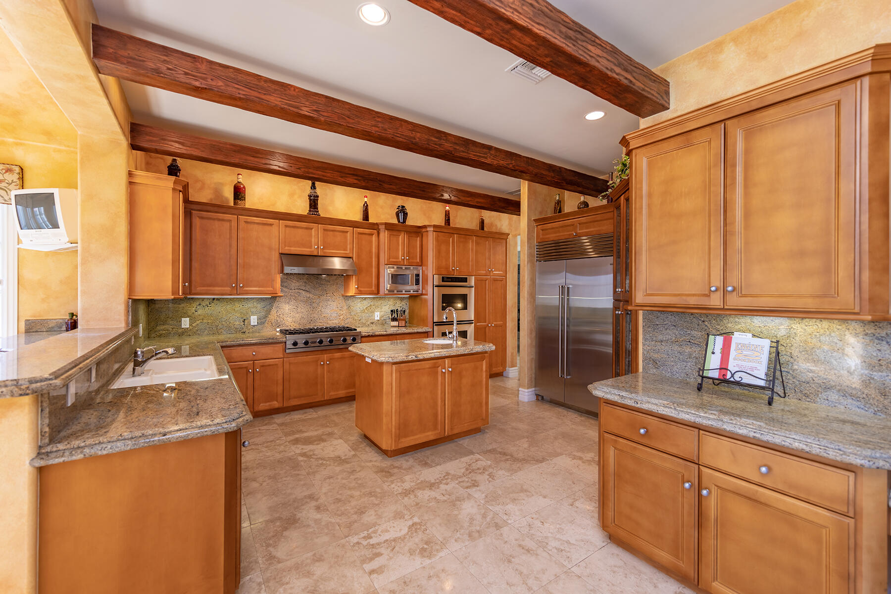 1000 Shokat Drive Ojai, CA 93023 - Photo 5 of 55 a kitchen with stainless steel appliances granite countertop a sink a stove and a refrigerator