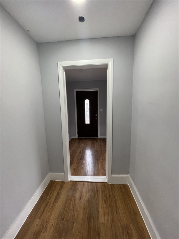 59 High Street Warren, MA 01083 - Photo 3 of 42 wooden floor in a hall with an empty room