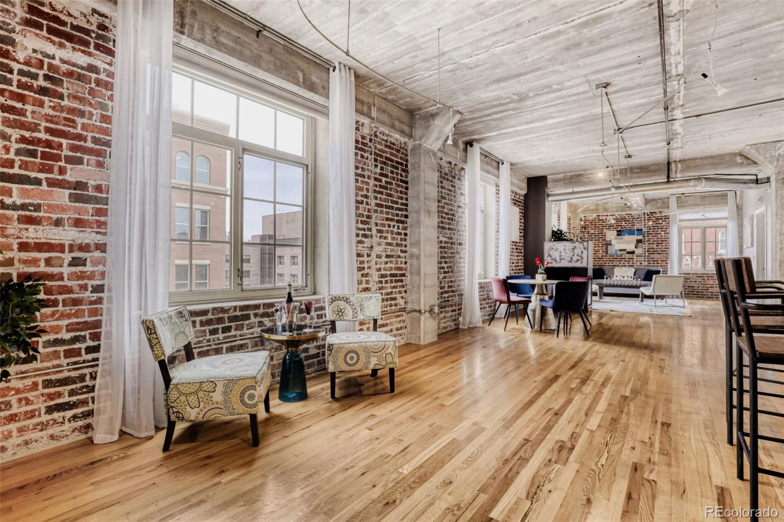 1449 Wynkoop Street, Unit 506 Denver, CO 80202 - Photo 9 of 39 a living room filled with furniture