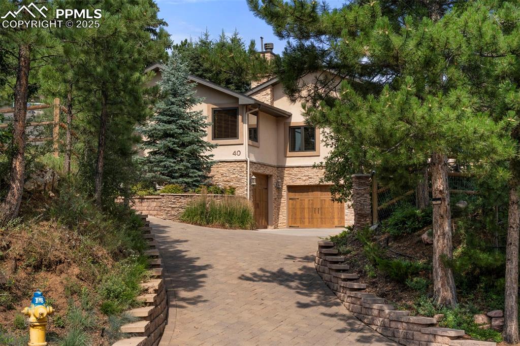 40 Upland Road Colorado Springs, CO 80906 - Photo 42 of 46 a view of a house with a yard