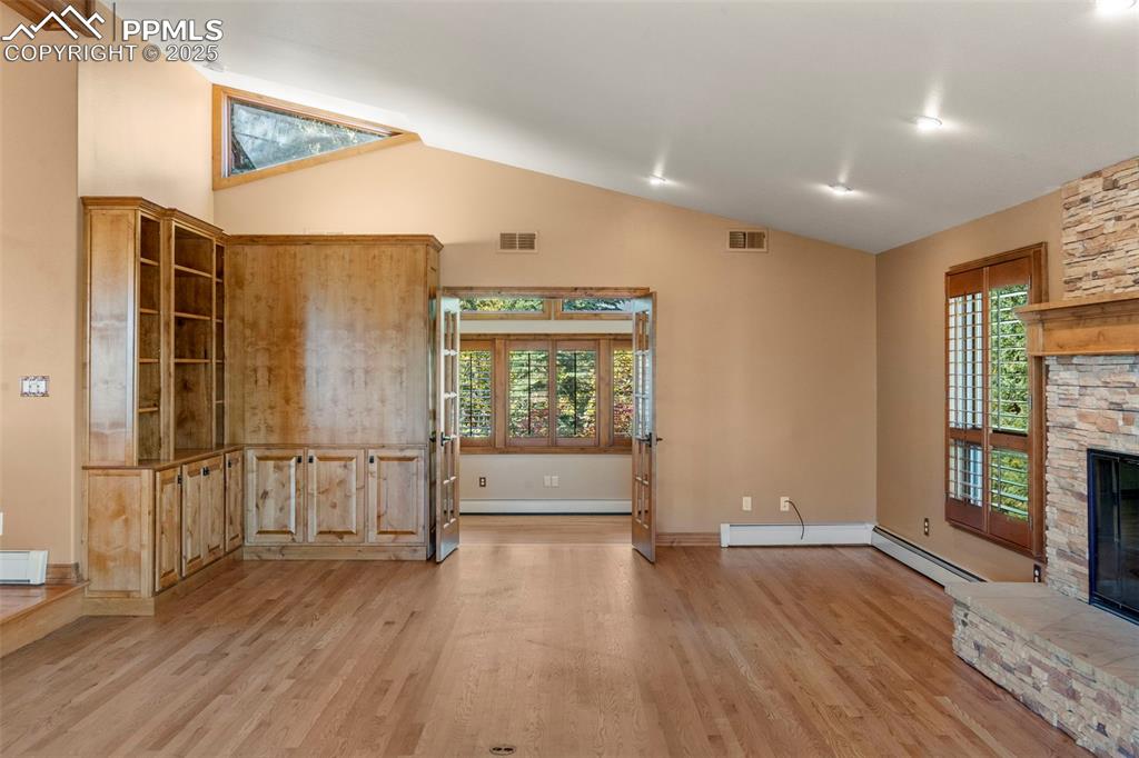 40 Upland Road Colorado Springs, CO 80906 - Photo 8 of 46 a view of empty room with wooden floor