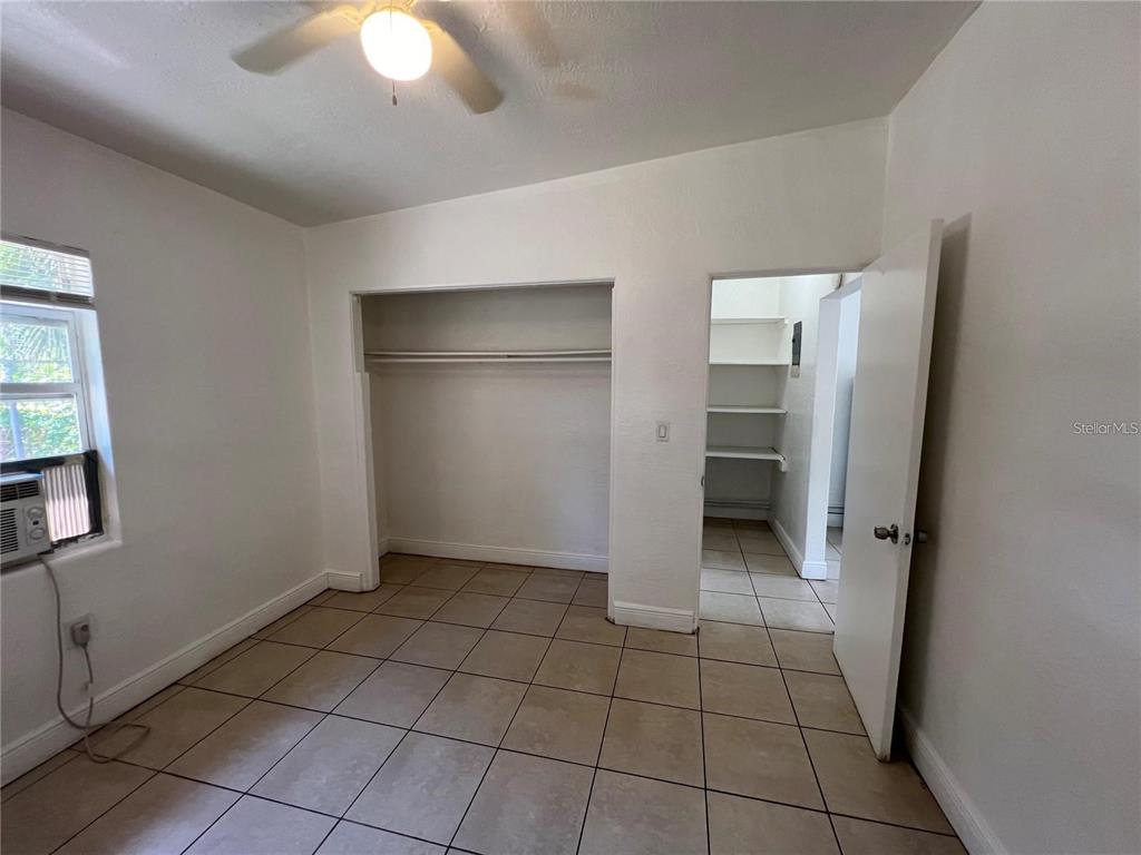 989 South Fiske Boulevard Rockledge, FL 32955 - Photo 8 of 14 a view of an empty room with closet and a window