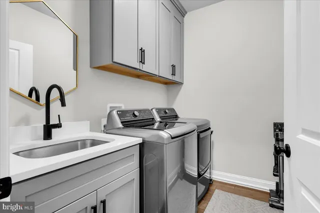 a view of a livingroom with wooden floor