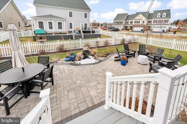 a view of a balcony and chairs