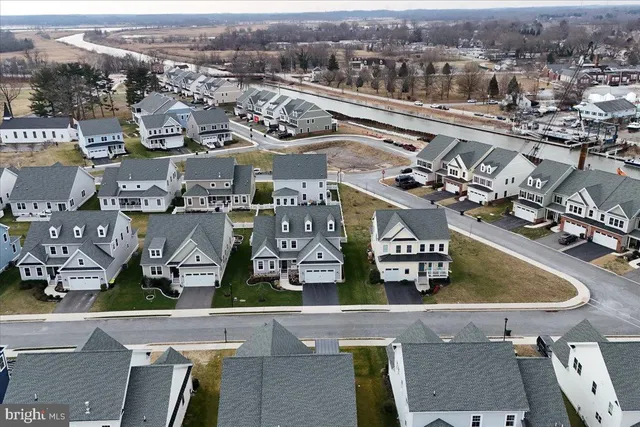 an aerial view of a house with a garden garage and garage
