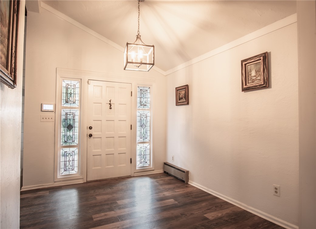 200 Chenault Road Townville, SC 29689 - Photo 5 of 47 A graceful entry with vaulted ceilings and beautiful wood flooring welcomes all guests.