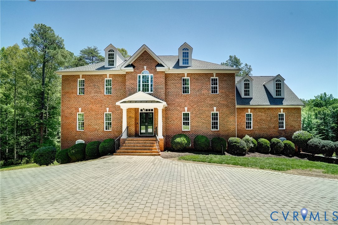 1295 Hermitage Road Manakin-Sabot, VA 23103 - Photo 6 of 55 a front view of a house with a yard