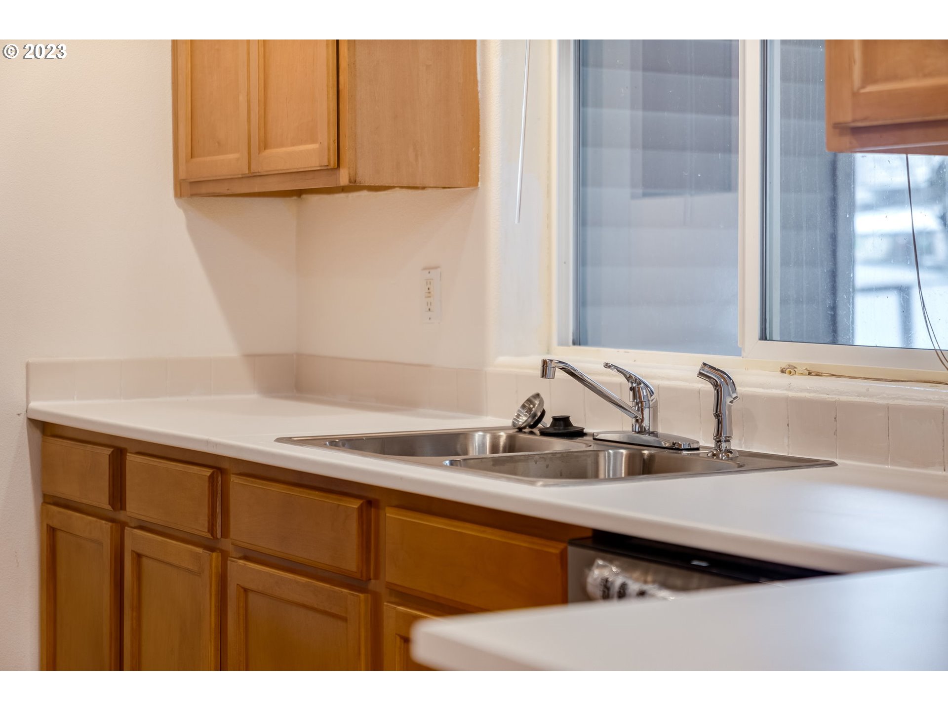 713 Northeast Mariners Loop Portland, OR 97211 - Photo 14 of 40 a bathroom with a sink and a mirror
