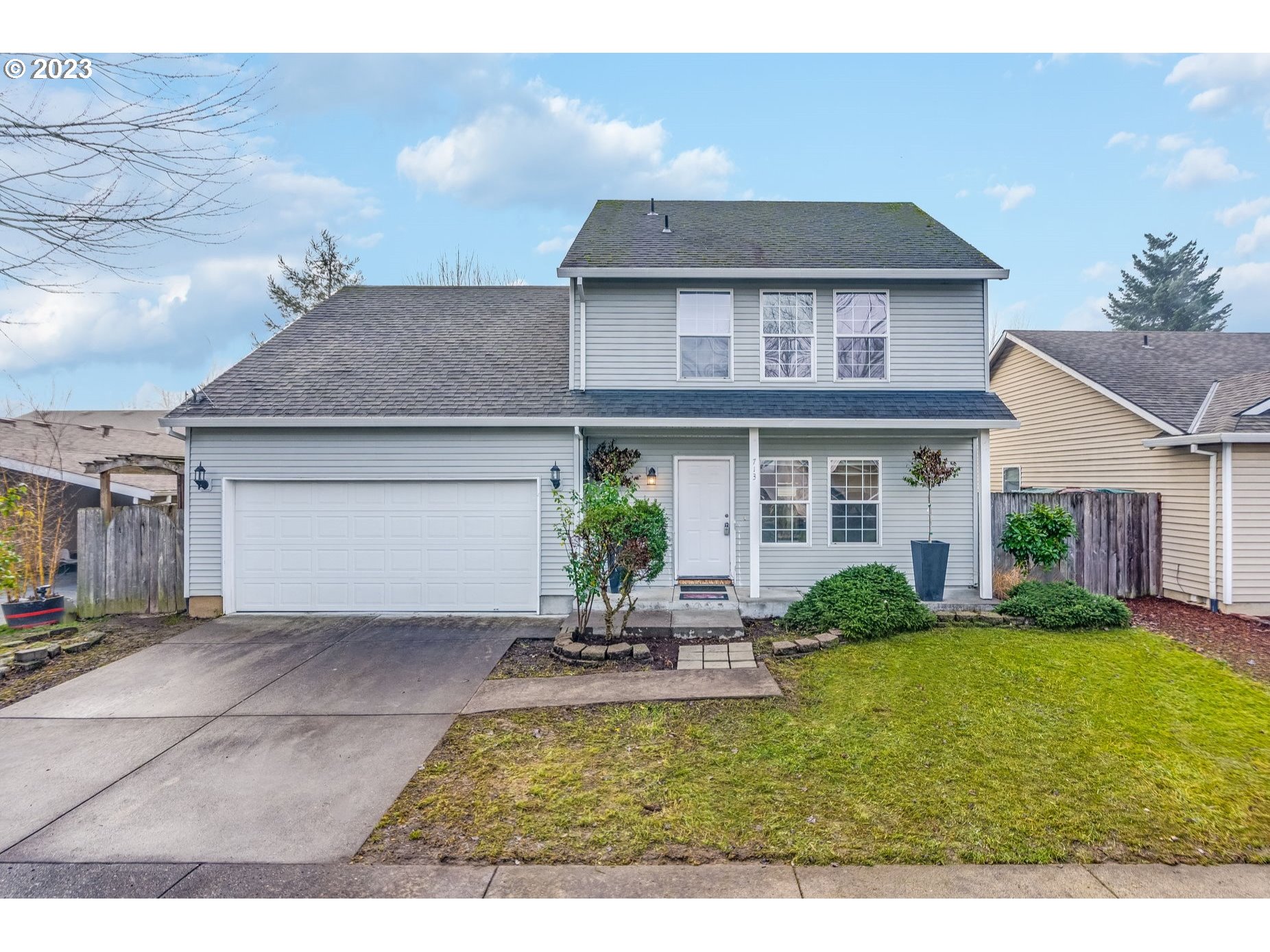 713 Northeast Mariners Loop Portland, OR 97211 - Photo 2 of 40 a house view with seating space and garden