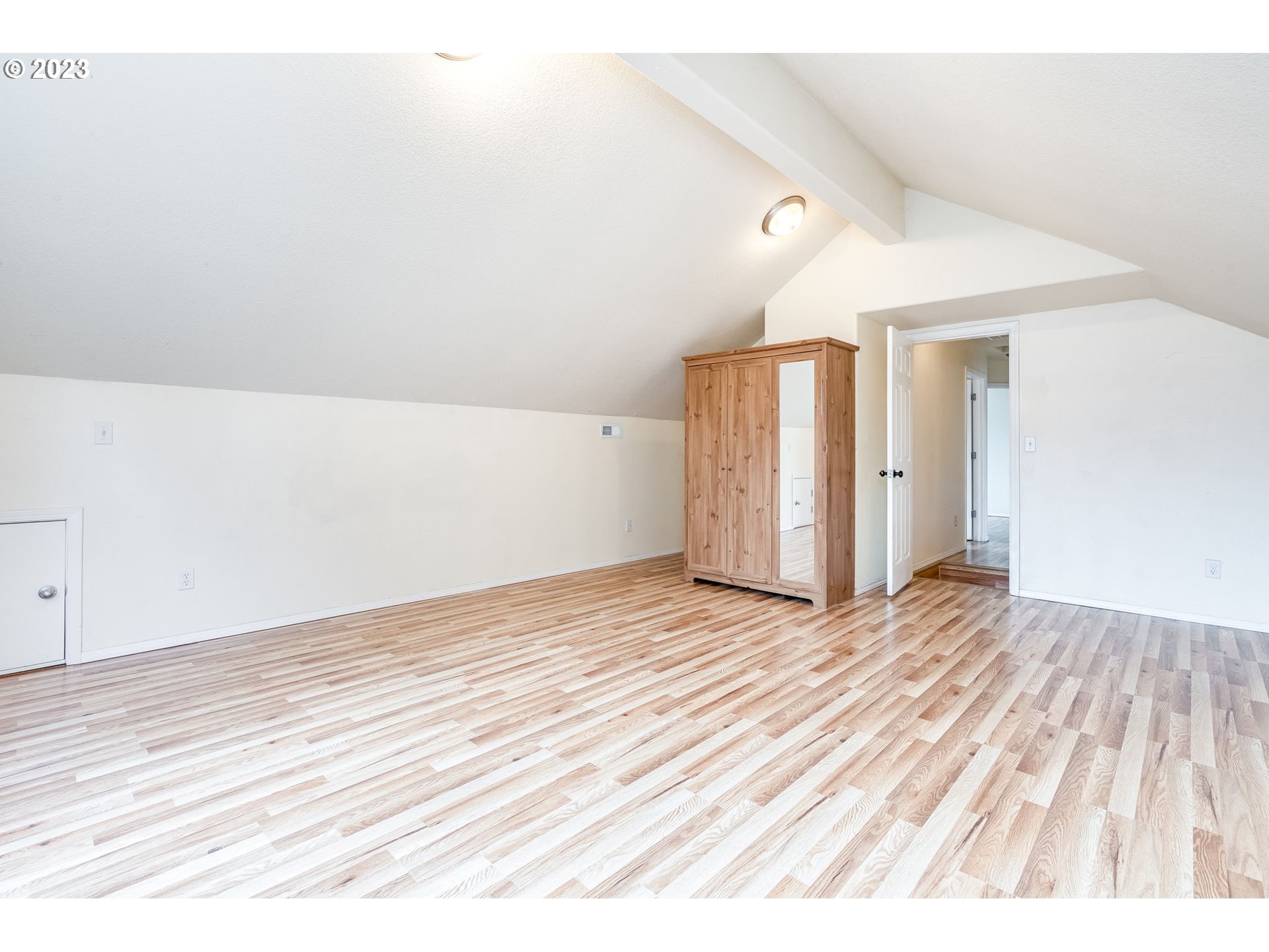 713 Northeast Mariners Loop Portland, OR 97211 - Photo 23 of 40 a view of a livingroom with wooden floor