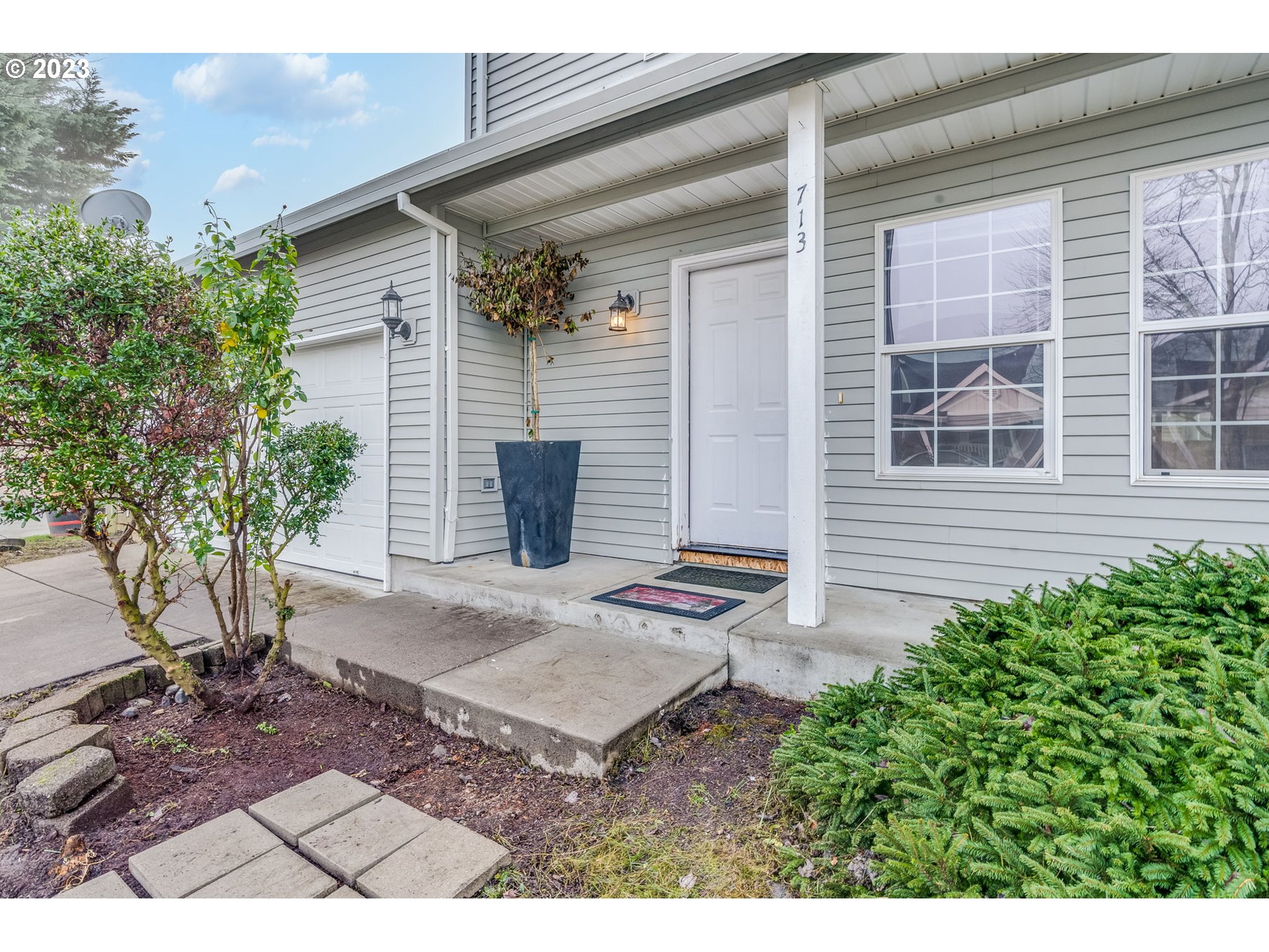 713 Northeast Mariners Loop Portland, OR 97211 - Photo 3 of 40 a backyard of a house with seating space
