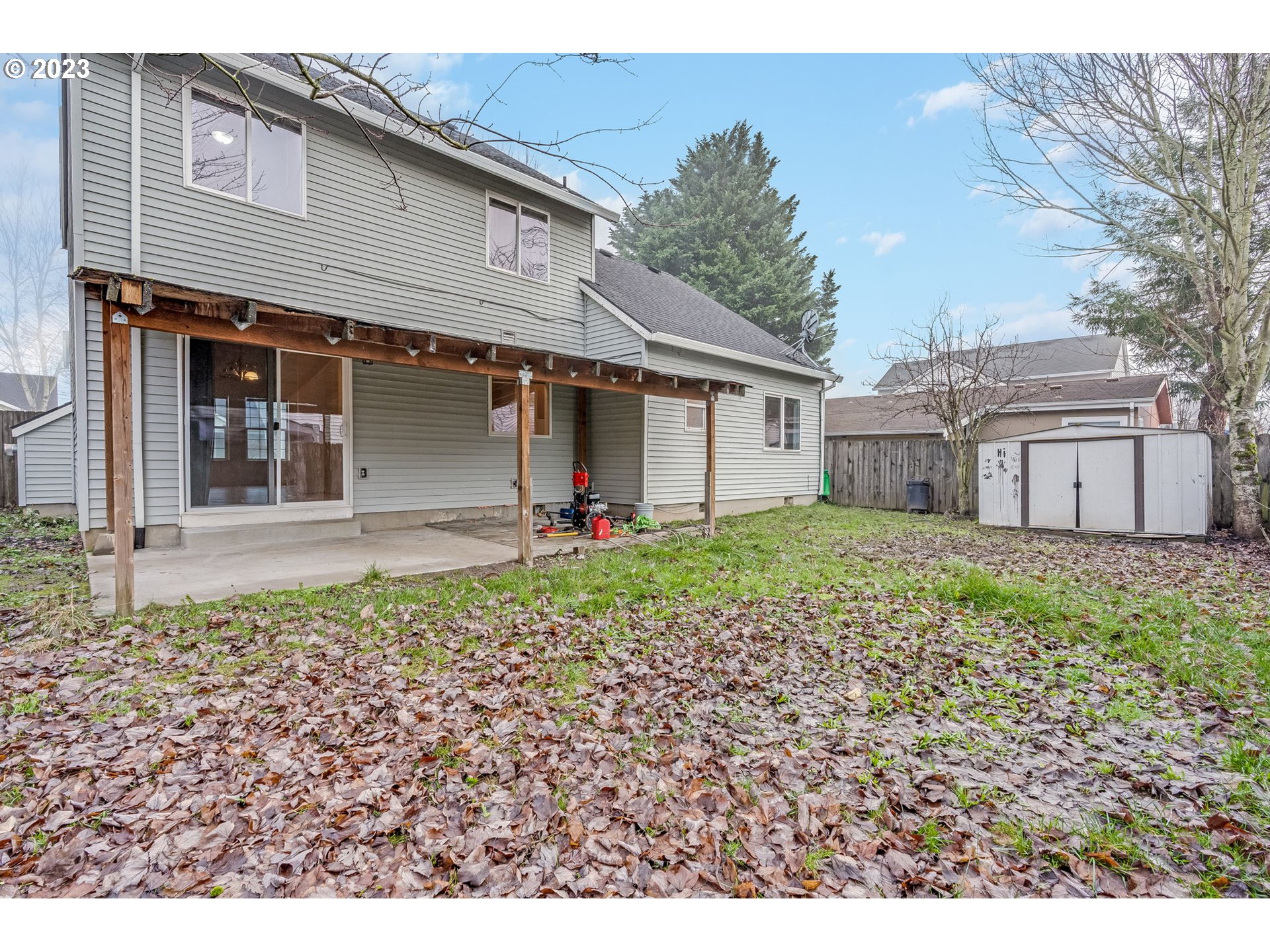 713 Northeast Mariners Loop Portland, OR 97211 - Photo 36 of 40 a front view of a house with garden