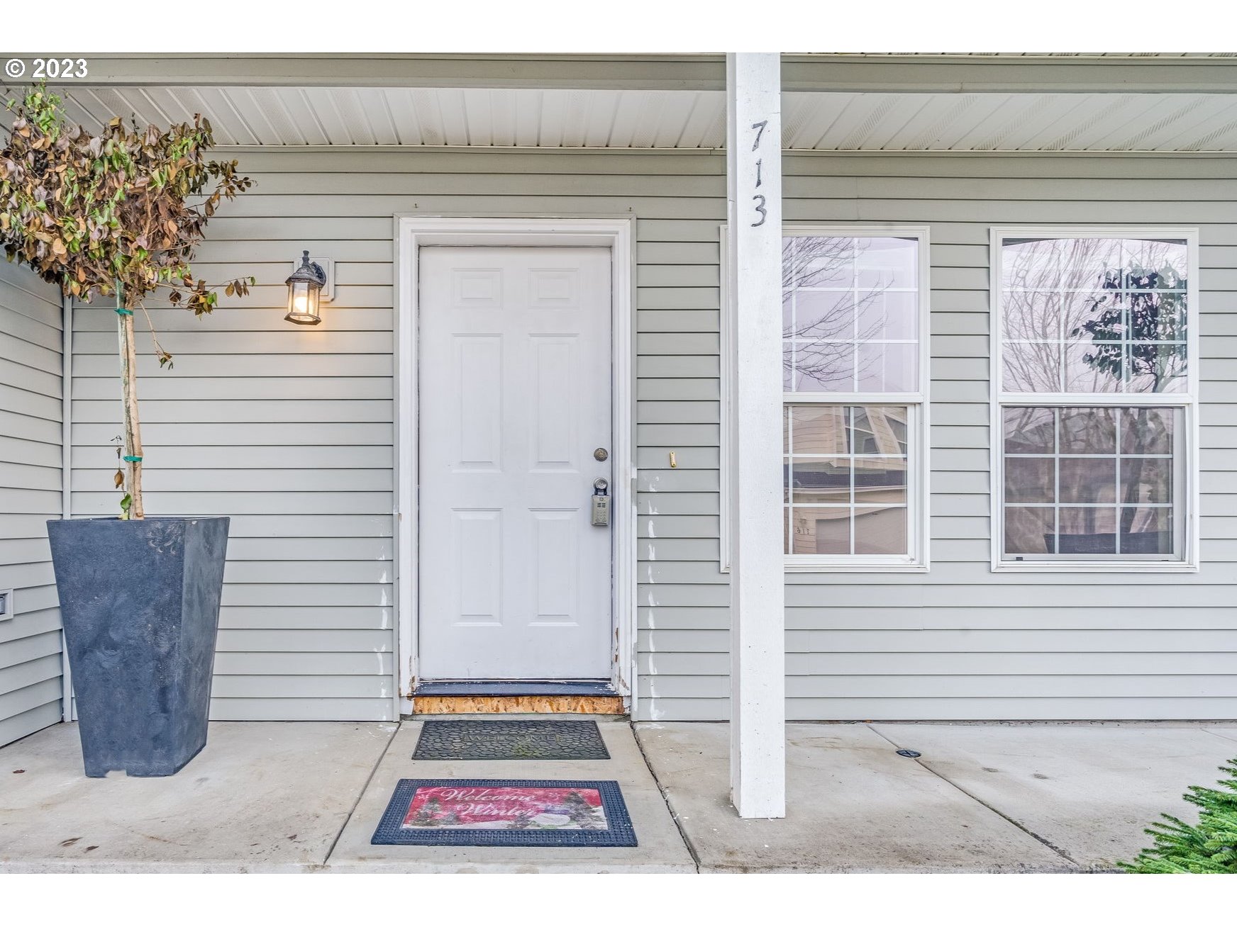 713 Northeast Mariners Loop Portland, OR 97211 - Photo 5 of 40 a view of a door and a window