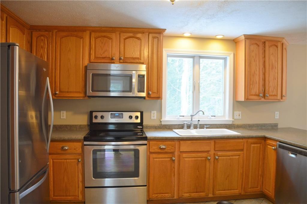 124 Waycross Way Limerick, ME 04048 - Photo 9 of 30 Sunny Kitchen with Newer Stainless...