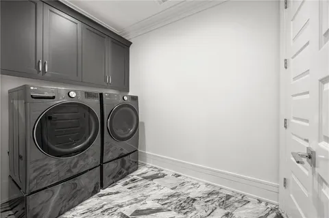 a view of a house with swimming pool and a yard