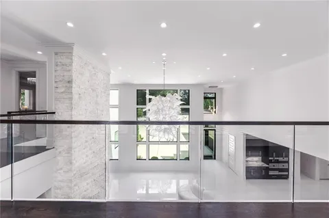 a view of a swimming pool with a yard