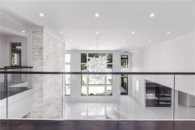 a view of a swimming pool with a yard