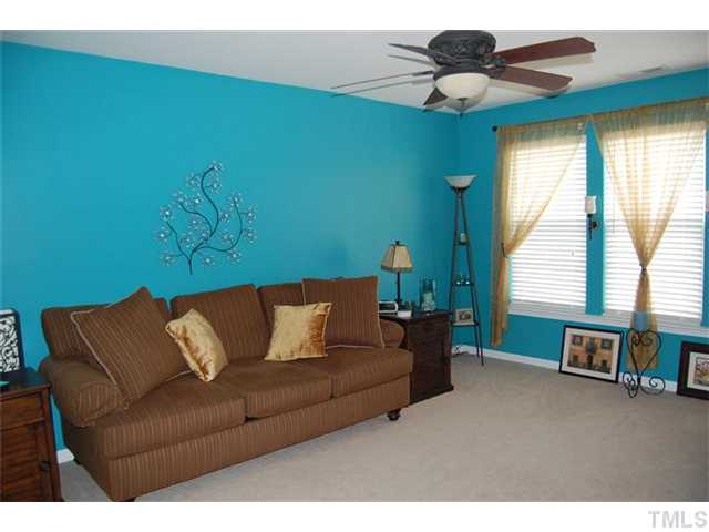5422 Regatta Way Raleigh, NC 27613 - Photo 12 of 18 a living room with furniture and a large window