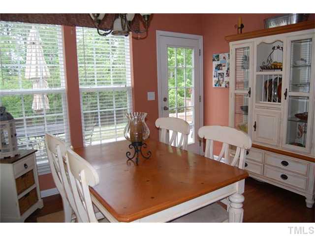 5422 Regatta Way Raleigh, NC 27613 - Photo 6 of 18 a view of a dining room with furniture and window
