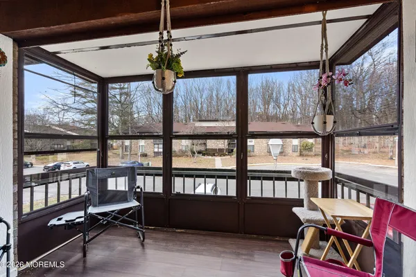 a view of a livingroom with furniture window and outside view