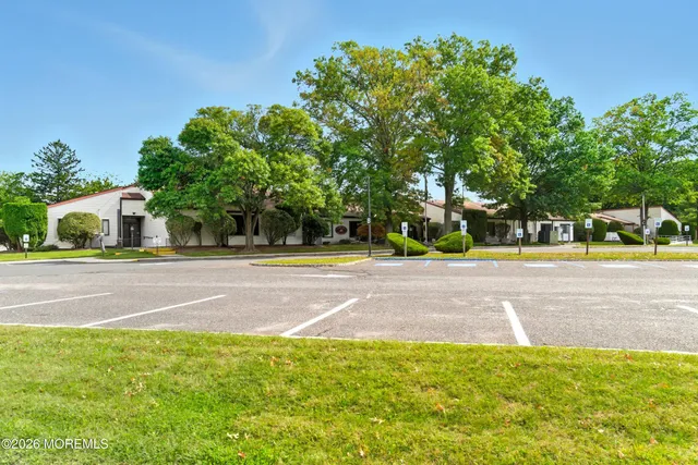 a view of garden with trees