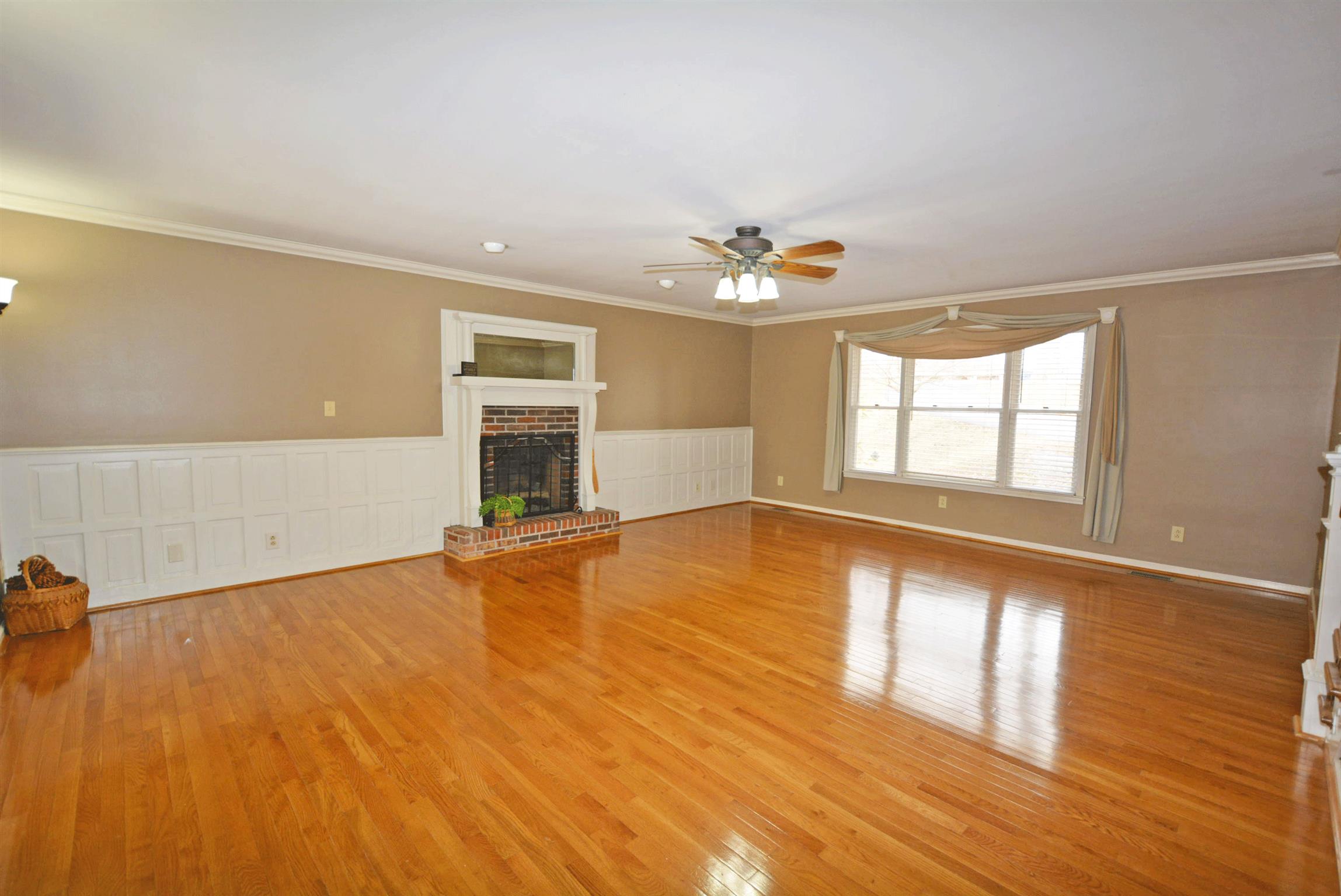 Fireplace surrounded by detailed carpentry work