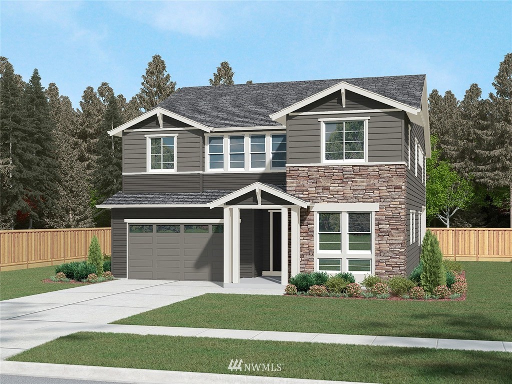 304 Field Place Southeast Renton, WA 98059 - Photo 1 of 10 a front view of a house with a yard