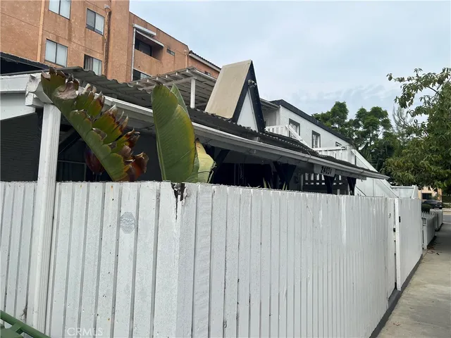 a view of a porch with wooden floor and outdoor space