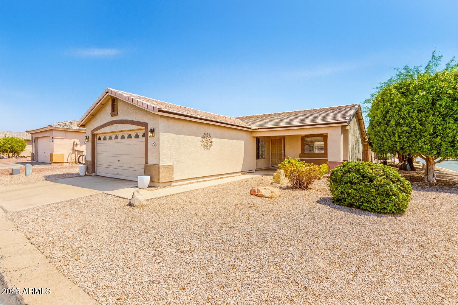 a view of a house with a snow in the yard