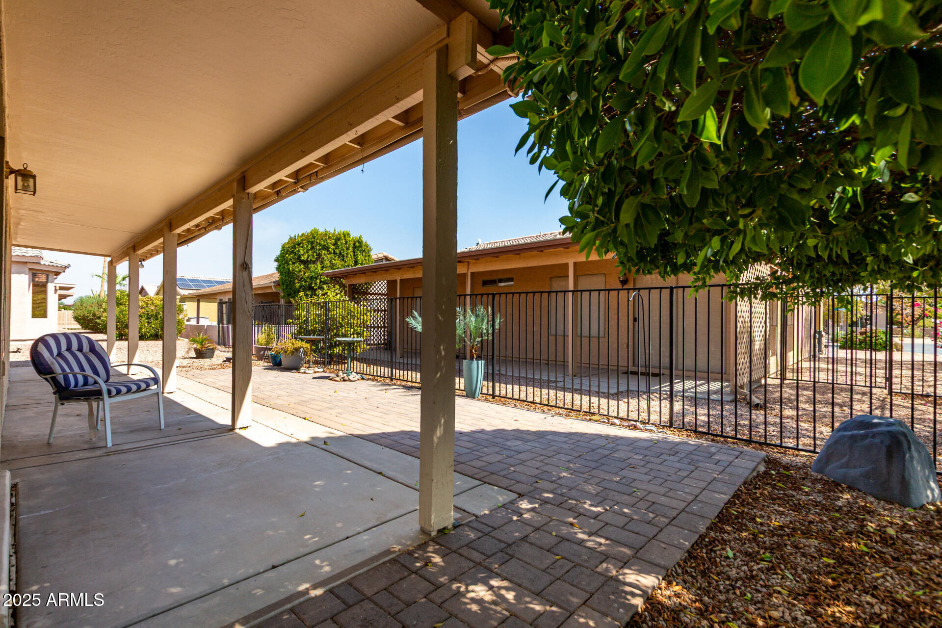 2101 South Meridian Road, Unit 301 Apache Junction, AZ 85120 - Photo 17 of 30 a view of a porch with a backyard