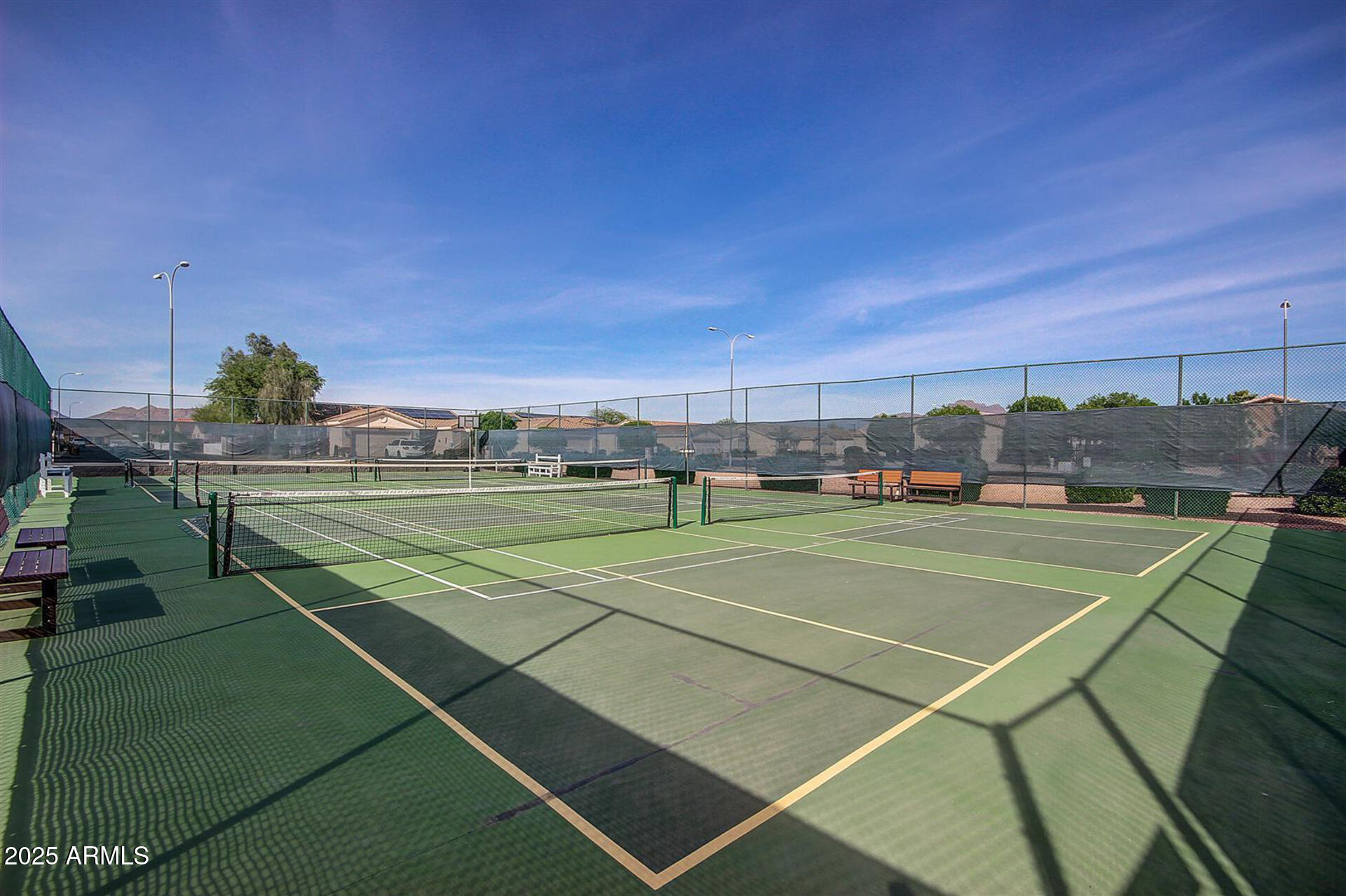 2101 South Meridian Road, Unit 301 Apache Junction, AZ 85120 - Photo 25 of 30 a view of a tennis court