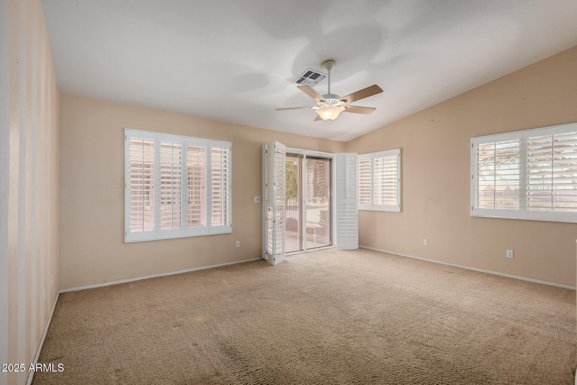 2101 South Meridian Road, Unit 301 Apache Junction, AZ 85120 - Photo 6 of 30 a view of an empty room with a window