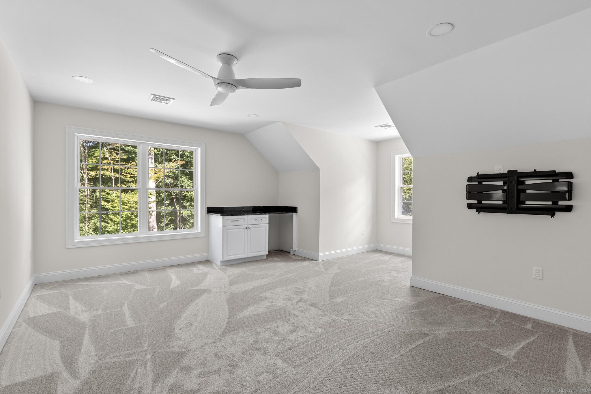 289 Young Street East Hampton, CT 06424 - Photo 11 of 15 a view of a livingroom with a staircase