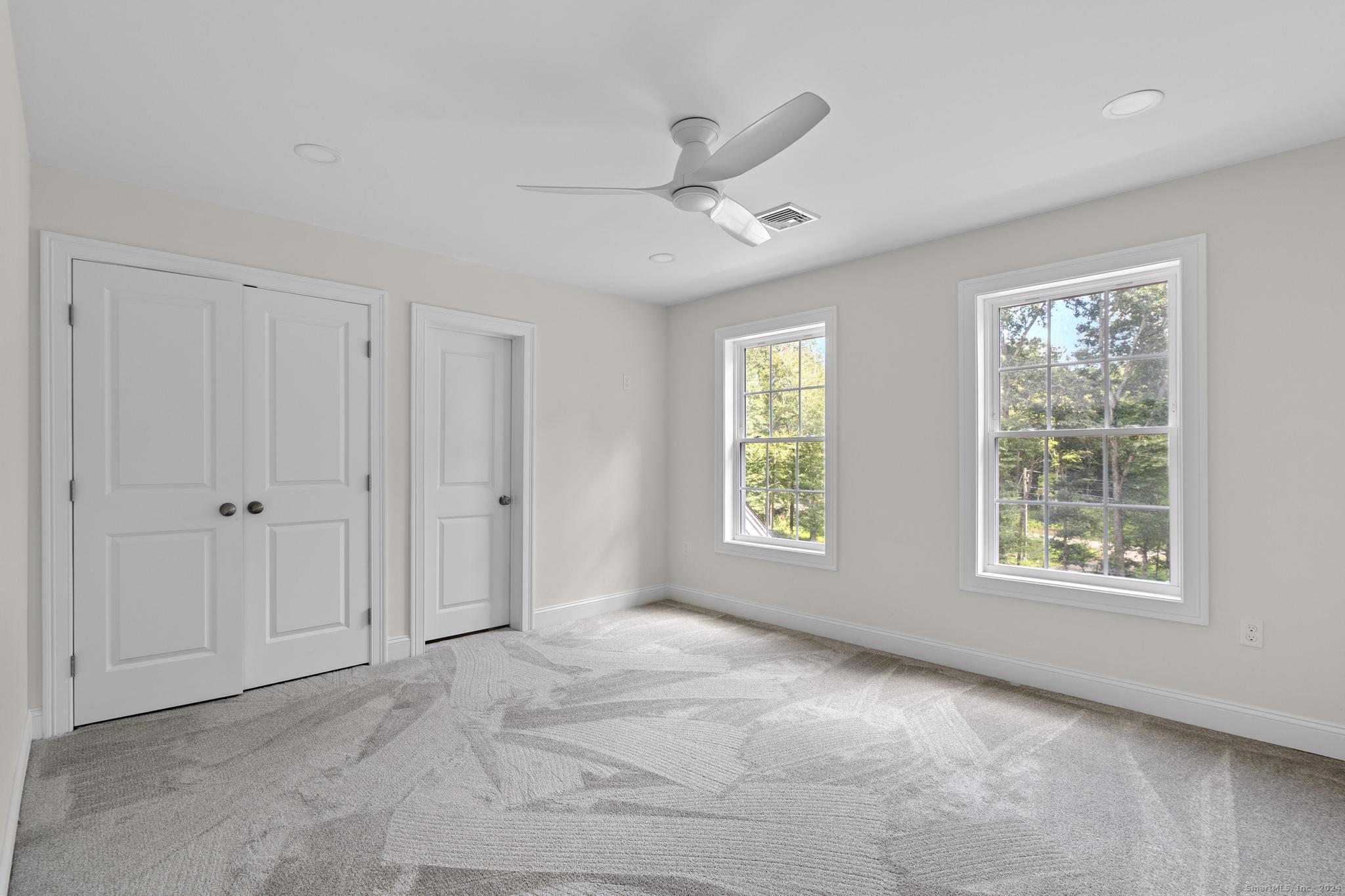 289 Young Street East Hampton, CT 06424 - Photo 13 of 15 a view of an empty room with a window