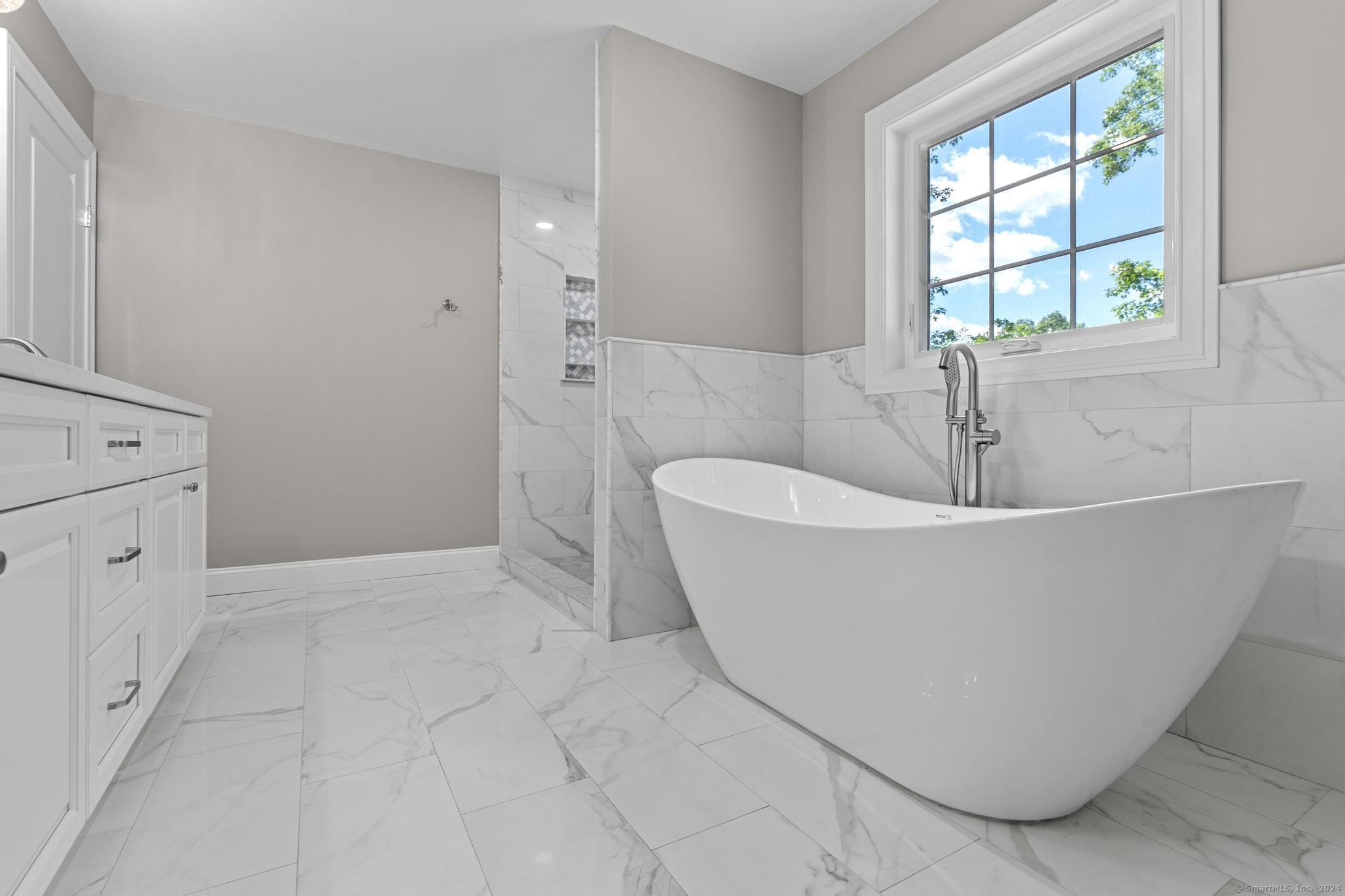 289 Young Street East Hampton, CT 06424 - Photo 10 of 15 a view of a bathtub in a bathroom