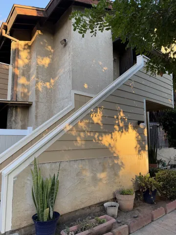 a vase of flowers sitting on a table