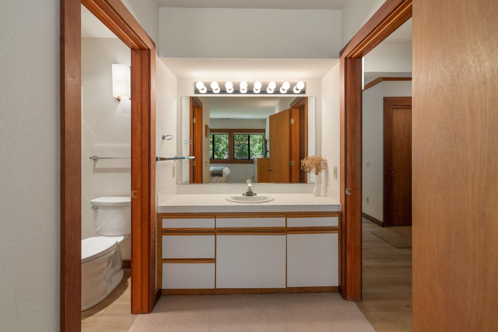 1591 Olympic Vly Road, Unit 29 Olympic Valley, CA 96146 - Photo 5 of 28 a bathroom with a sink and a mirror