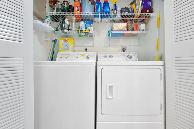 a utility room with dryer and washer