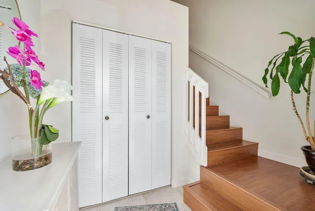 a view of entryway with flower pots