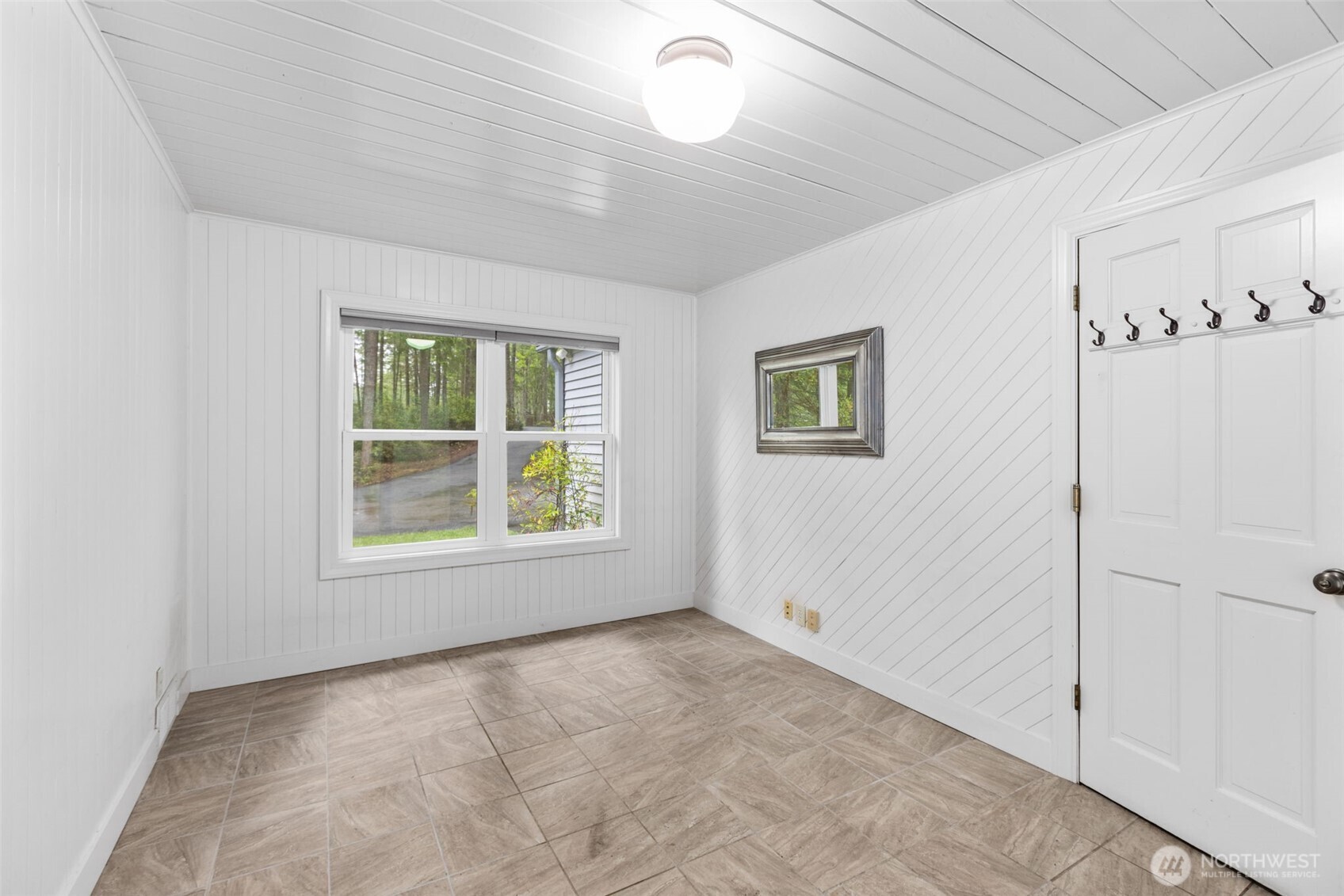 100 East Twanoh Heights Road South Belfair, WA 98528 - Photo 15 of 40 an empty room with windows