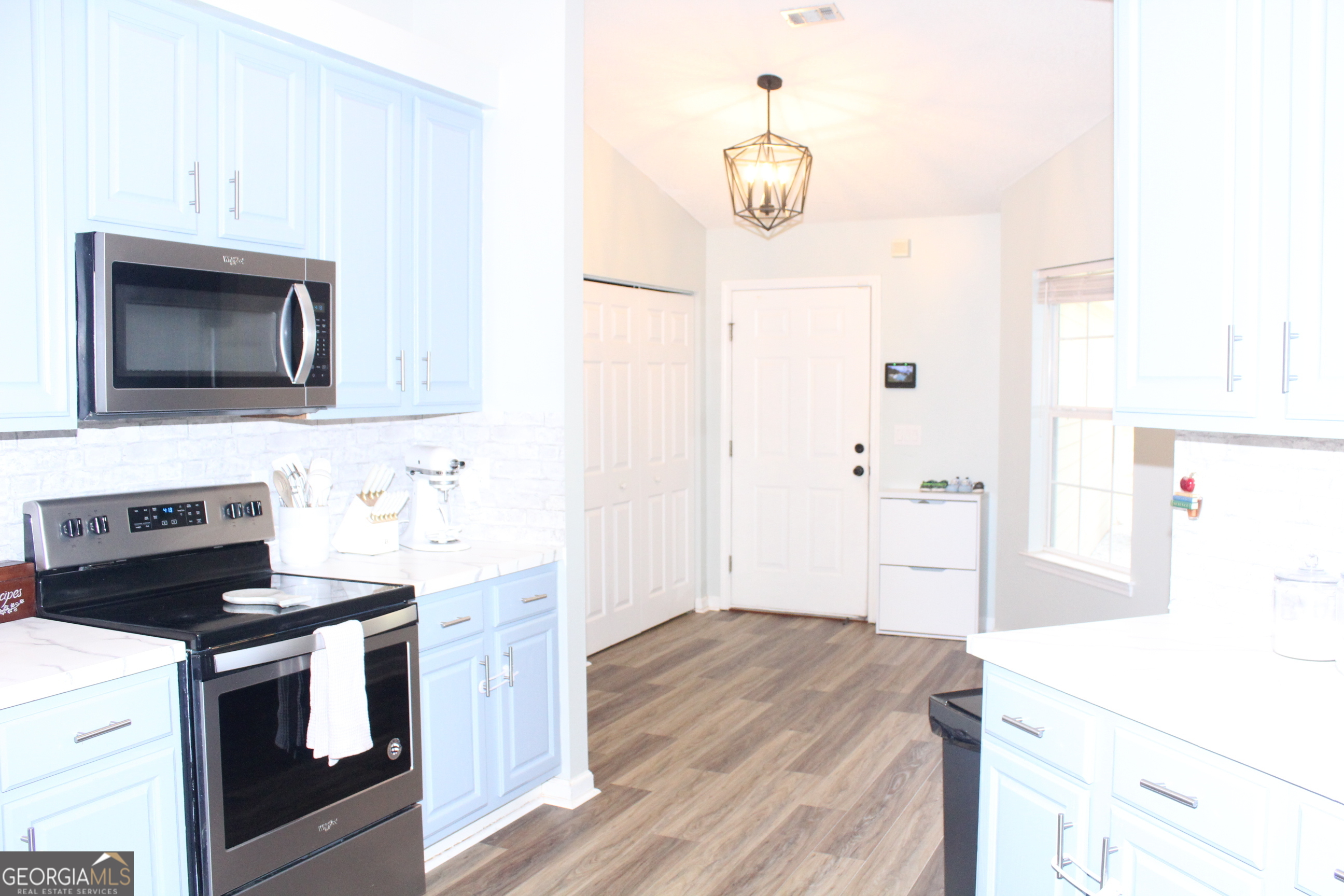 824 East Hilton Avenue Kingsland, GA 31548 - Photo 11 of 20 a kitchen with a stove and a microwave