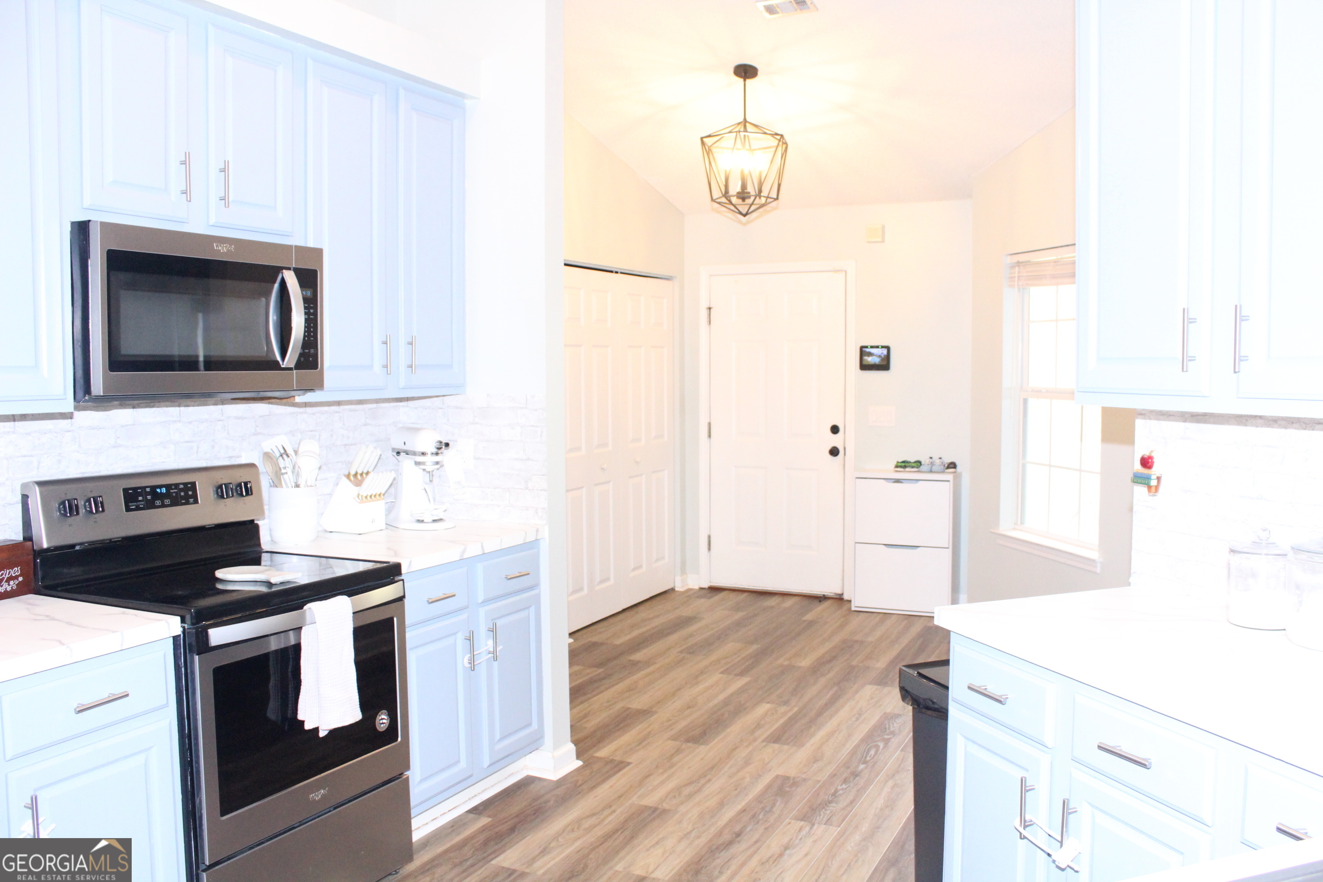 824 East Hilton Avenue Kingsland, GA 31548 - Photo 12 of 20 a kitchen with a stove and a microwave
