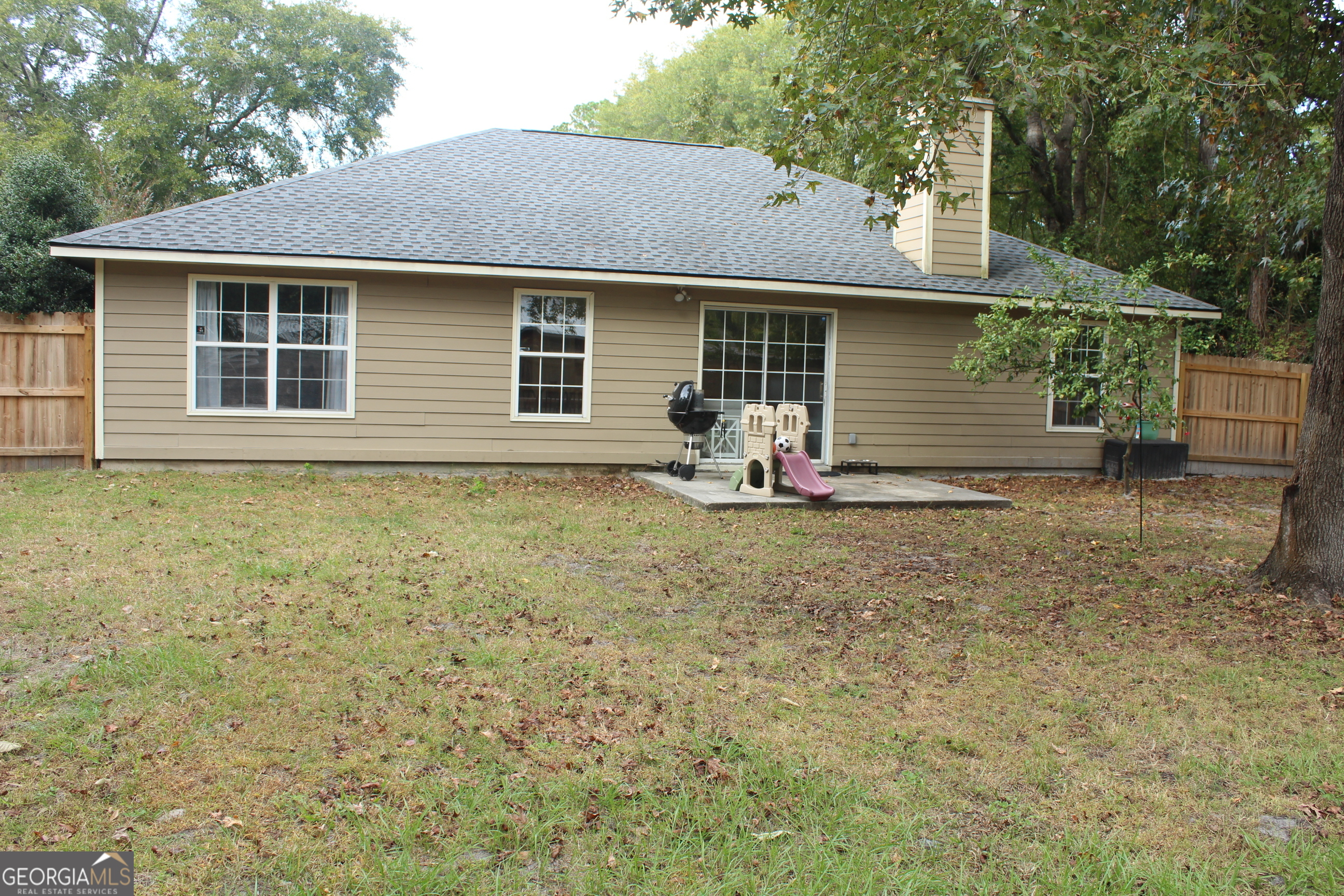 824 East Hilton Avenue Kingsland, GA 31548 - Photo 17 of 20 a front view of a house with a yard