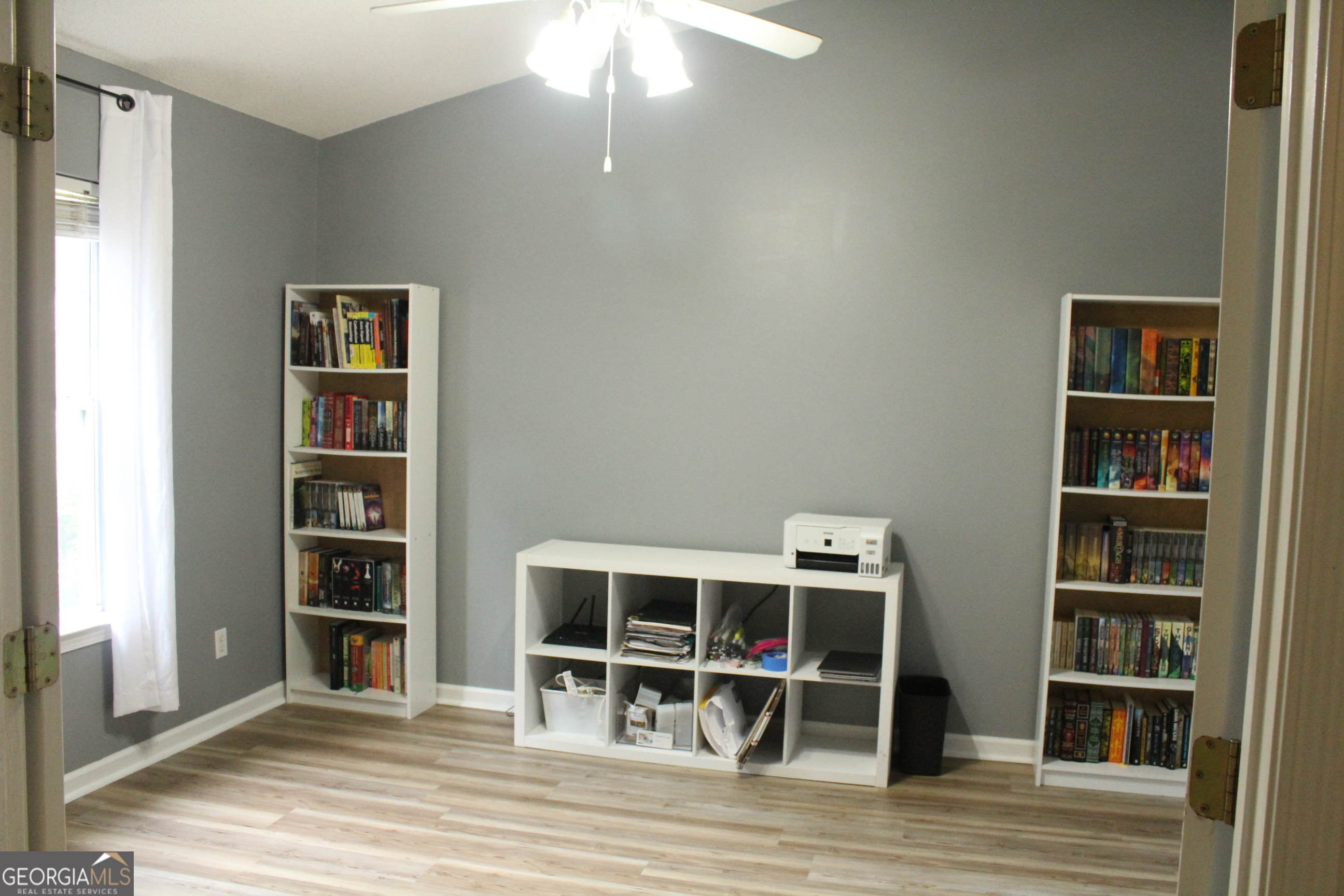 824 East Hilton Avenue Kingsland, GA 31548 - Photo 3 of 20 a view of a livingroom with furniture and closet