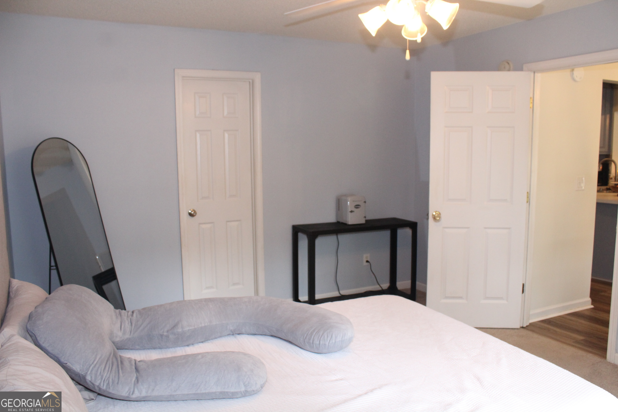 824 East Hilton Avenue Kingsland, GA 31548 - Photo 5 of 20 a bedroom with a bed and a chair
